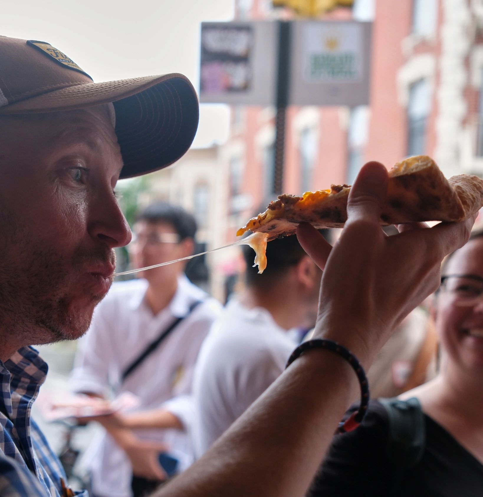 person eating pizza